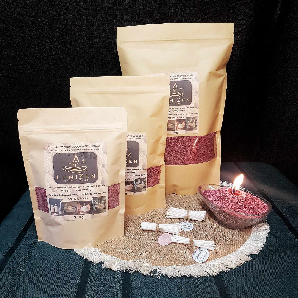 Lumizen Candle Sand wine_red_3_sizes displayed with burning candle sand 