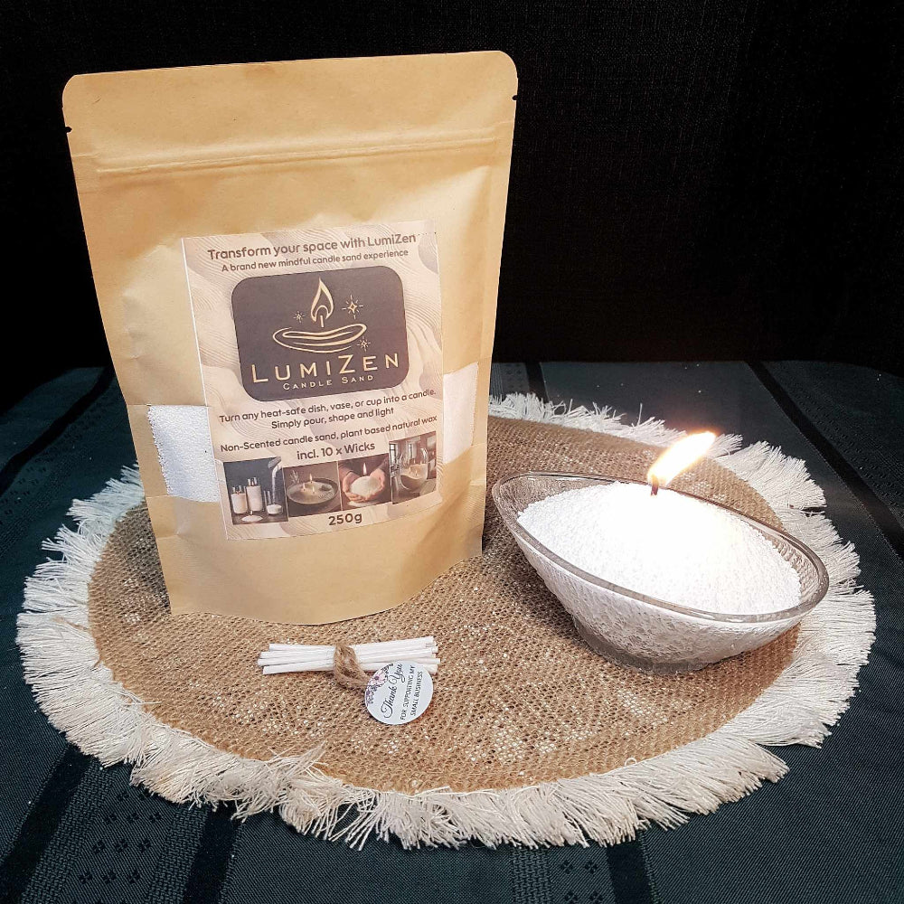 Lumizen candle sand white 250g display with burning candle sand 